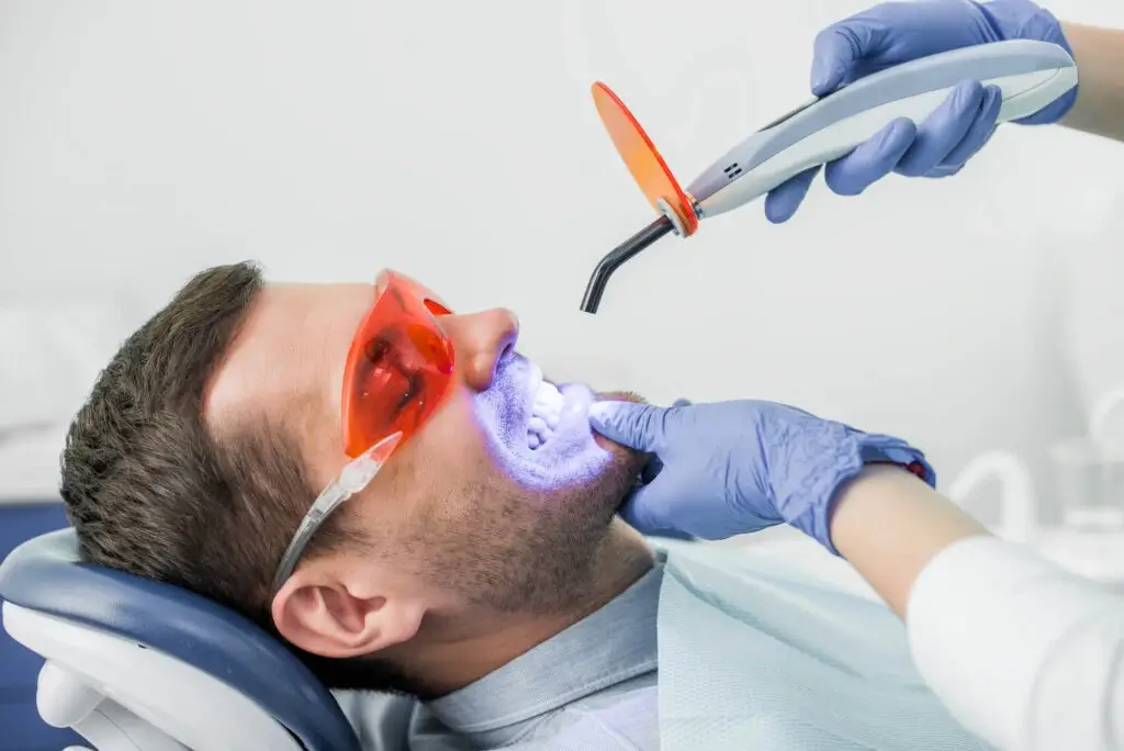 patient getting auburn teeth whitening treatment